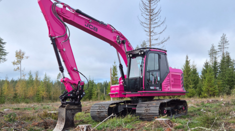 Pinkki JCB kaivuri.